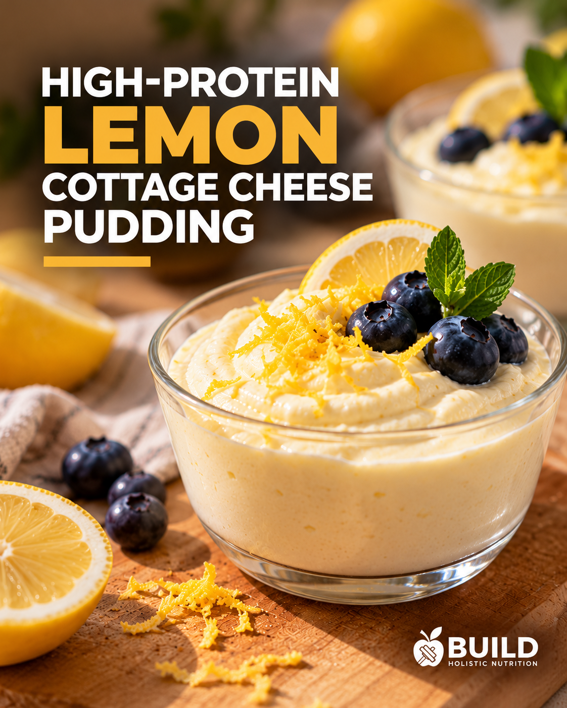 High-protein lemon cottage cheese pudding topped with blueberries, lemon zest and mint